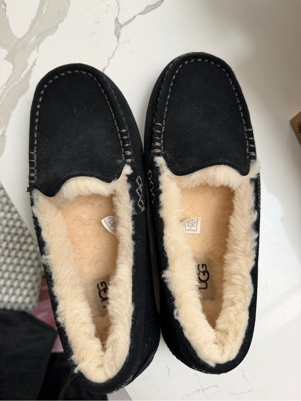 Brand new Black UGG Moccasins